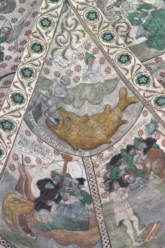 Målning med en gul fisk med en vit man i munnen. Dekorationer i grönt och runtom. två målningar under som visar en gapande fisk och människor i en båt.